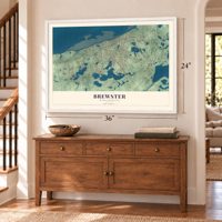 Brewster, Massachusetts map, 24 x 36 inch print in a white frame above a dresser by a staircase