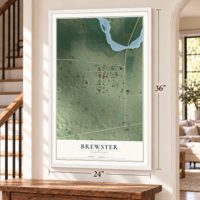 Brewster, Nebraska map, 24 x 36 inch print in a white frame by a staircase