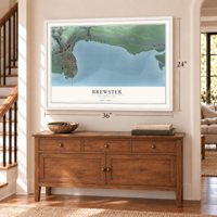 Brewster, Washington map, 24 x 36 inch print in a white frame above a dresser by a staircase