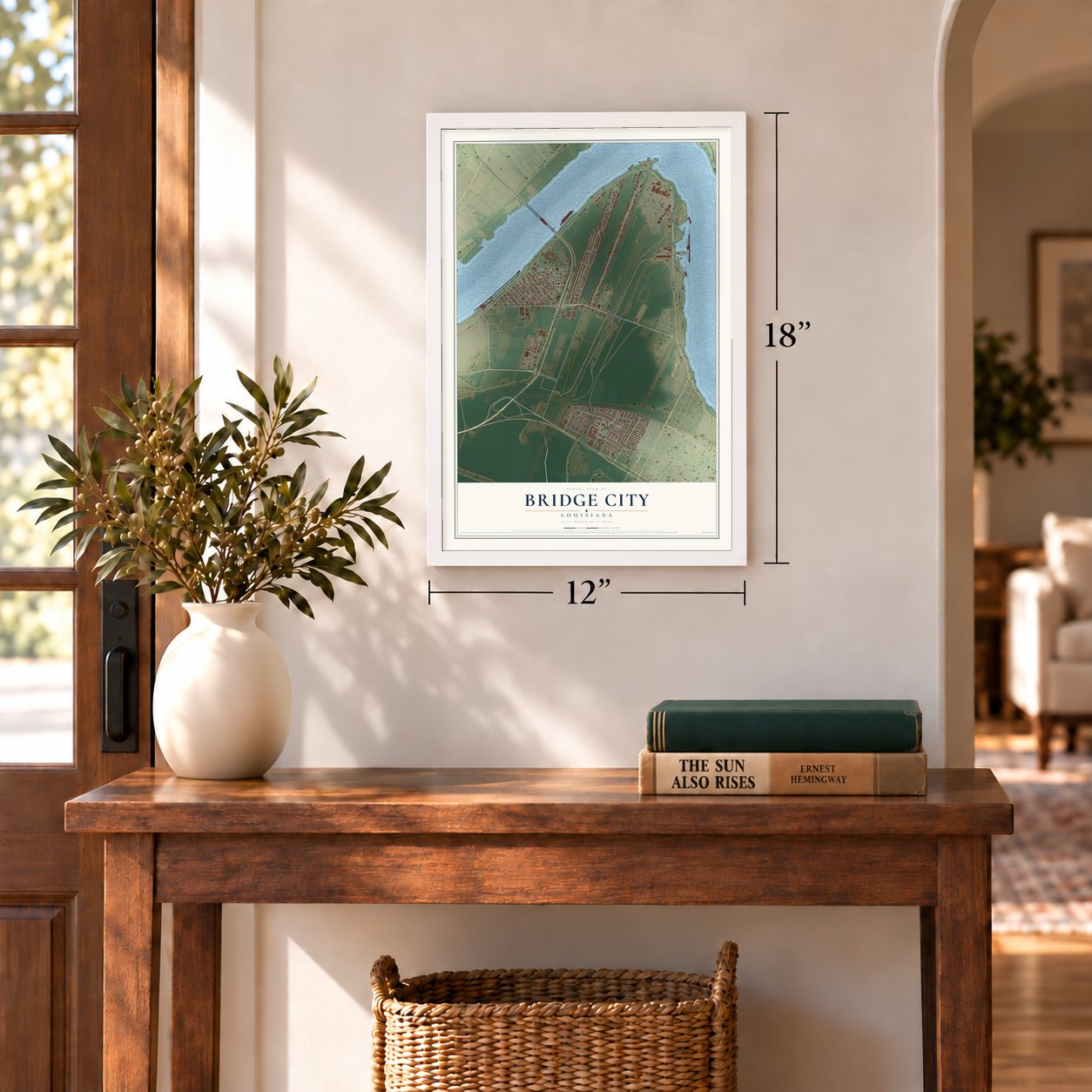 Bridge City, Louisiana map, 12 x 18 inch print in a white frame in an entryway