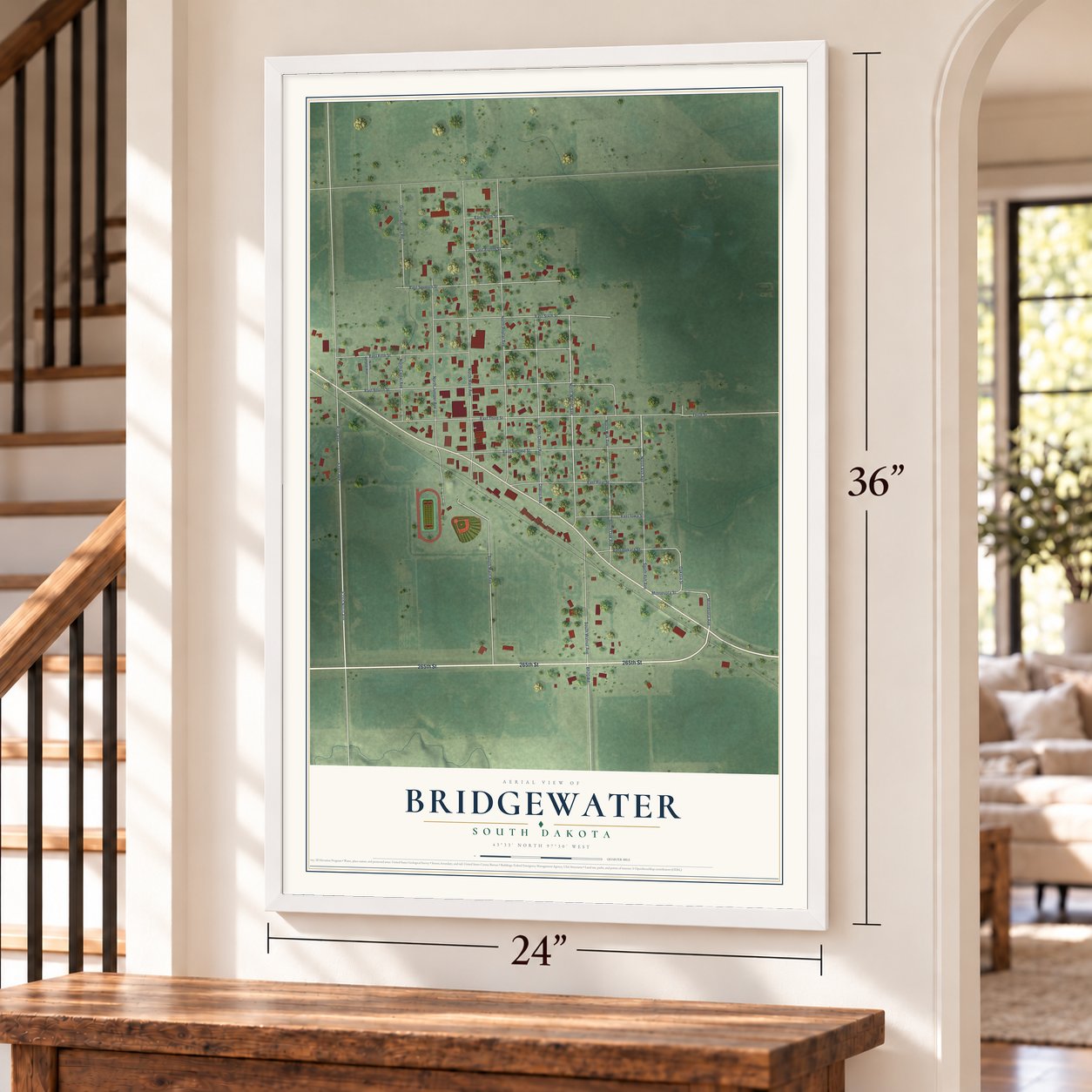 Bridgewater, South Dakota map, 24 x 36 inch print in a white frame by a staircase