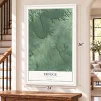 Briggs, Oklahoma map, 24 x 36 inch print in a white frame by a staircase