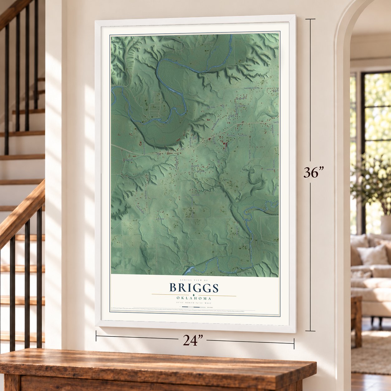 Briggs, Oklahoma map, 24 x 36 inch print in a white frame by a staircase