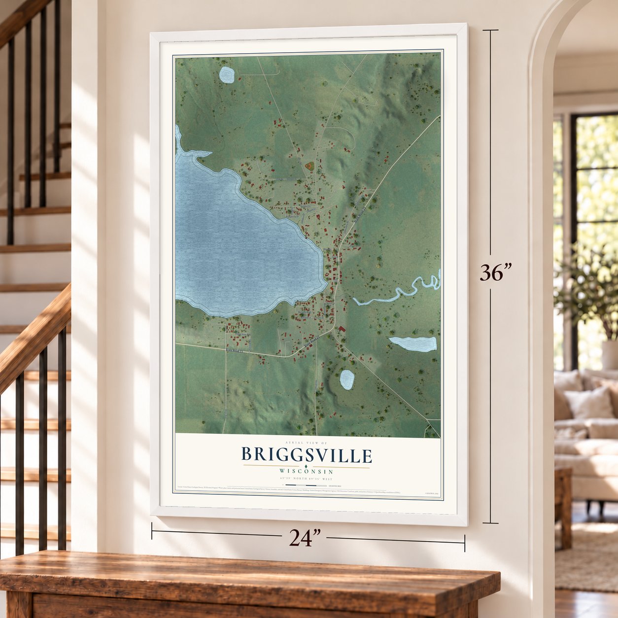 Briggsville, Wisconsin map, 24 x 36 inch print in a white frame by a staircase