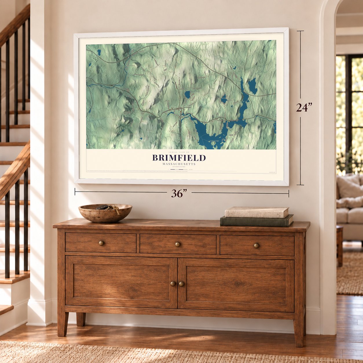 Brimfield, Massachusetts map, 24 x 36 inch print in a white frame above a dresser by a staircase