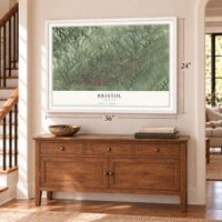 Bristol, Virginia map, 24 x 36 inch print in a white frame above a dresser by a staircase