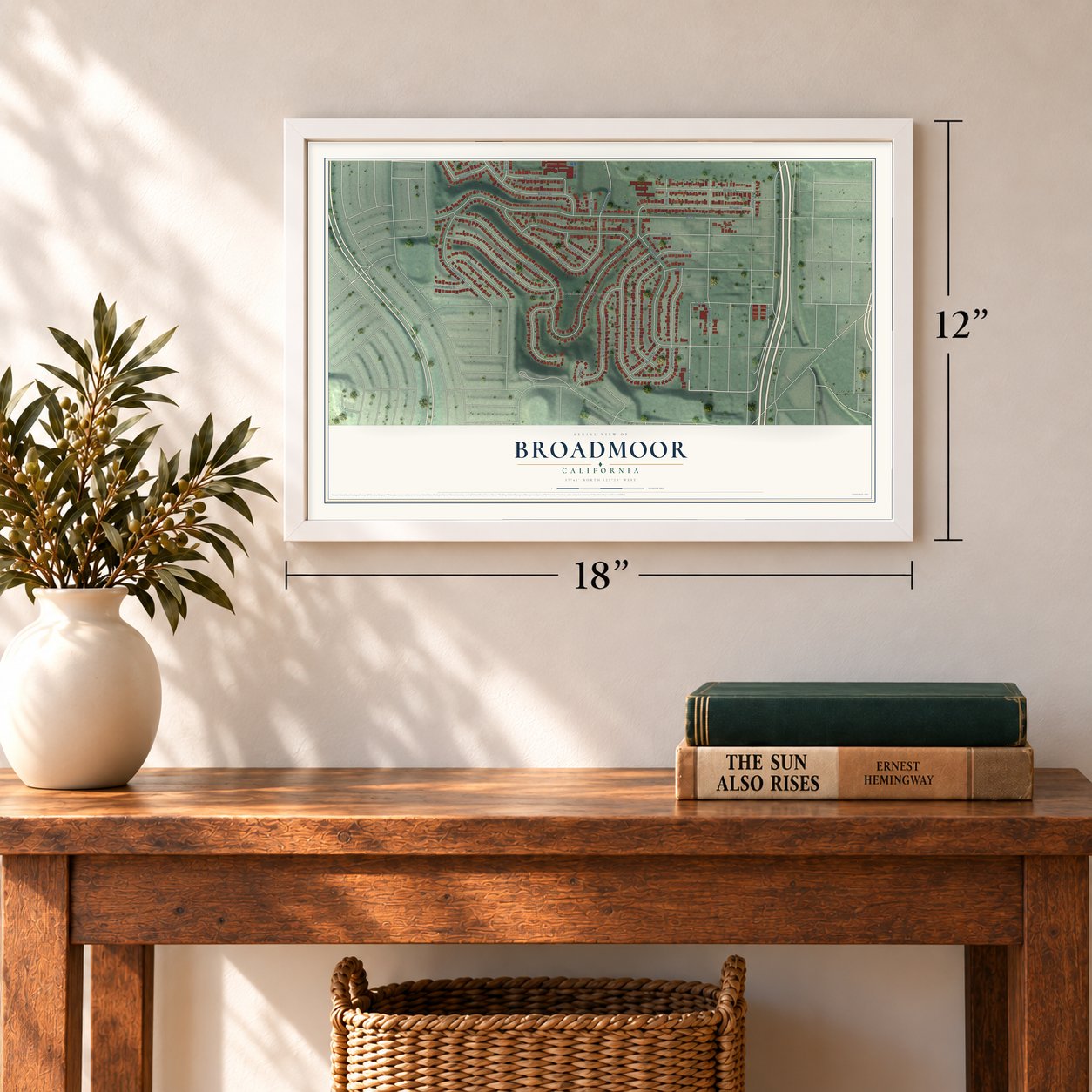 Broadmoor, California map, 12 x 18 inch print in a white frame in an entryway