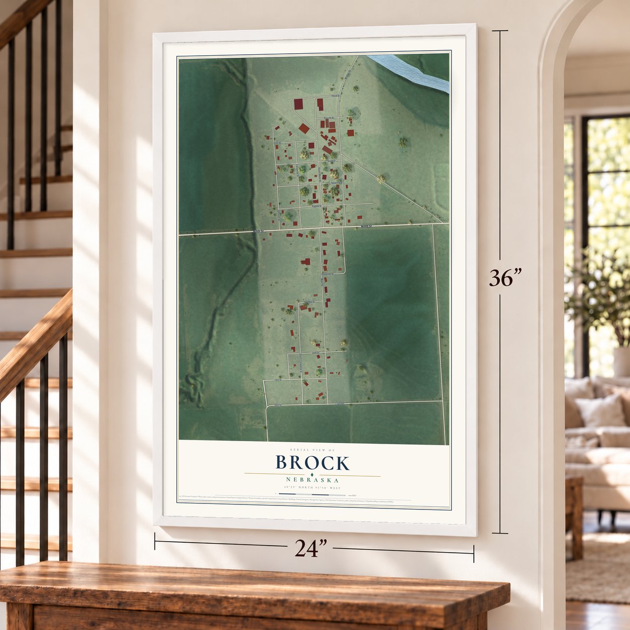 Brock, Nebraska map, 24 x 36 inch print in a white frame by a staircase