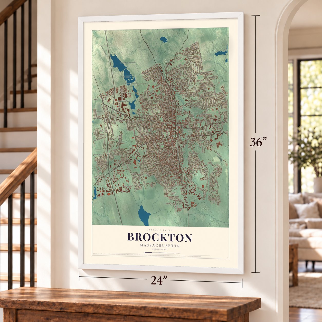 Brockton, Massachusetts map, 24 x 36 inch print in a white frame by a staircase