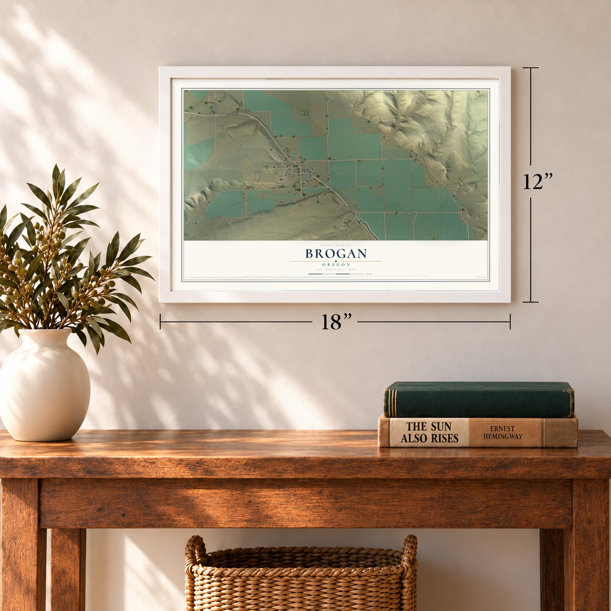 Brogan, Oregon map, 12 x 18 inch print in a white frame in an entryway