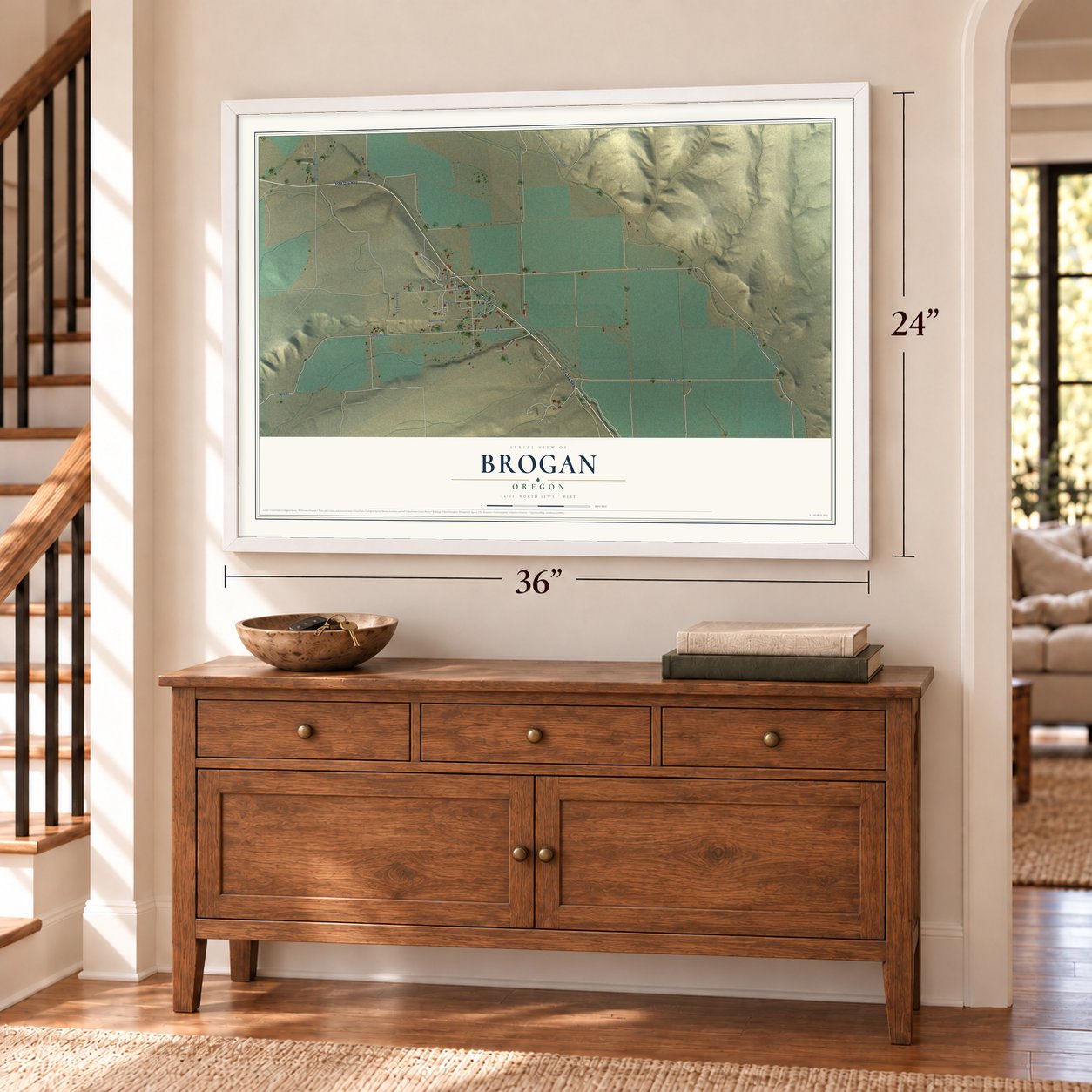 Brogan, Oregon map, 24 x 36 inch print in a white frame above a dresser by a staircase