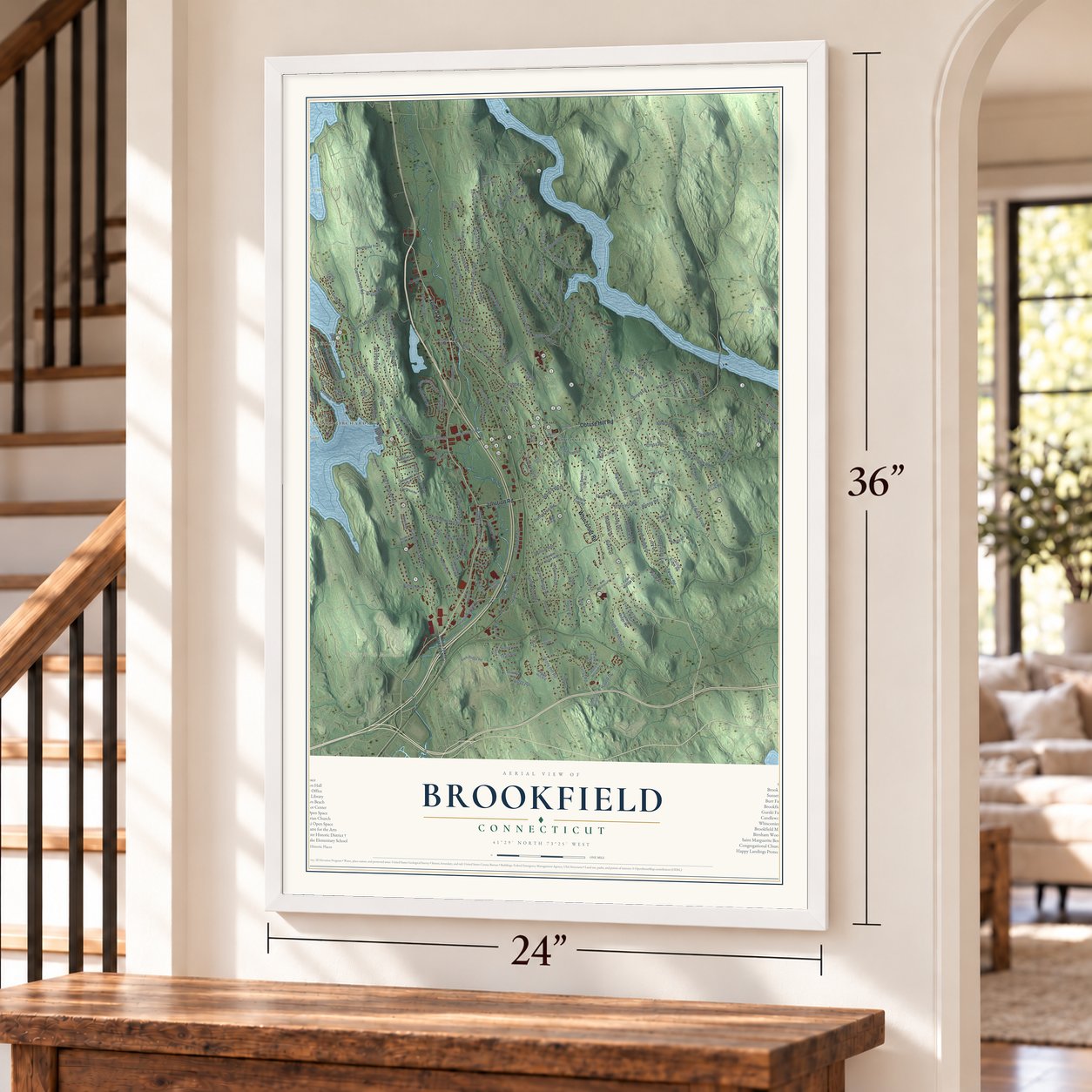 Brookfield, Connecticut map, 24 x 36 inch print in a white frame by a staircase