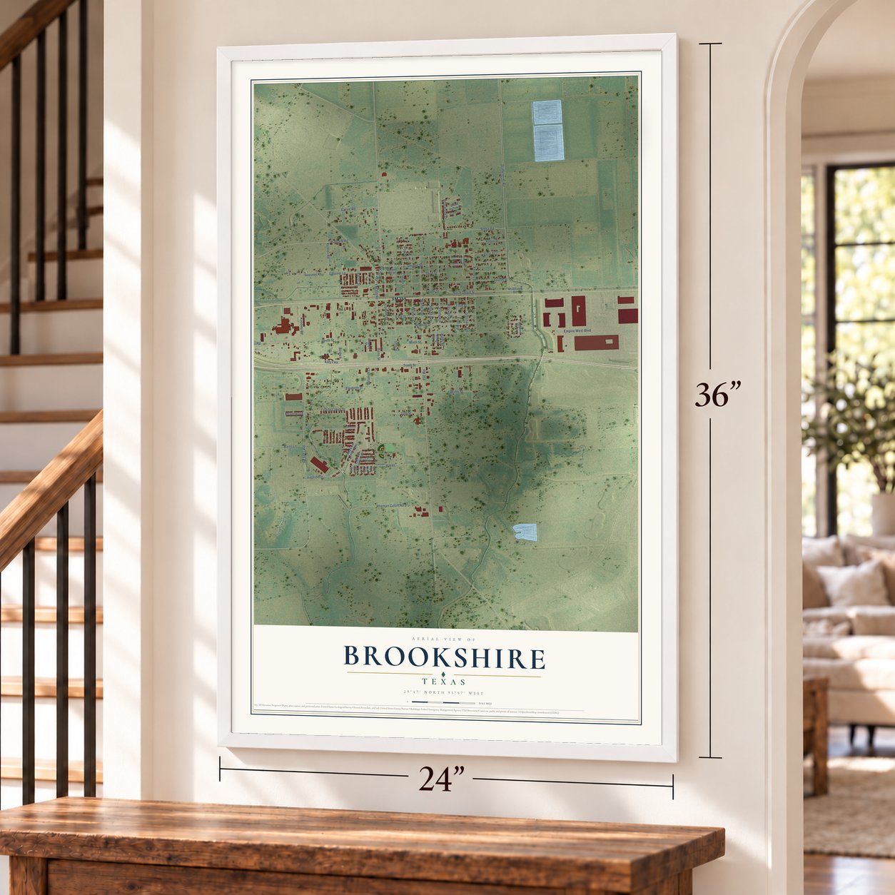 Brookshire, Texas map, 24 x 36 inch print in a white frame by a staircase