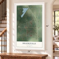 Brooksville, Mississippi map, 24 x 36 inch print in a white frame by a staircase