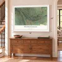 Brooktondale, New York map, 24 x 36 inch print in a white frame above a dresser by a staircase