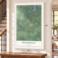 Broomfield, Michigan map, 24 x 36 inch print in a white frame by a staircase