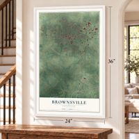 Brownsville, Tennessee map, 24 x 36 inch print in a white frame by a staircase