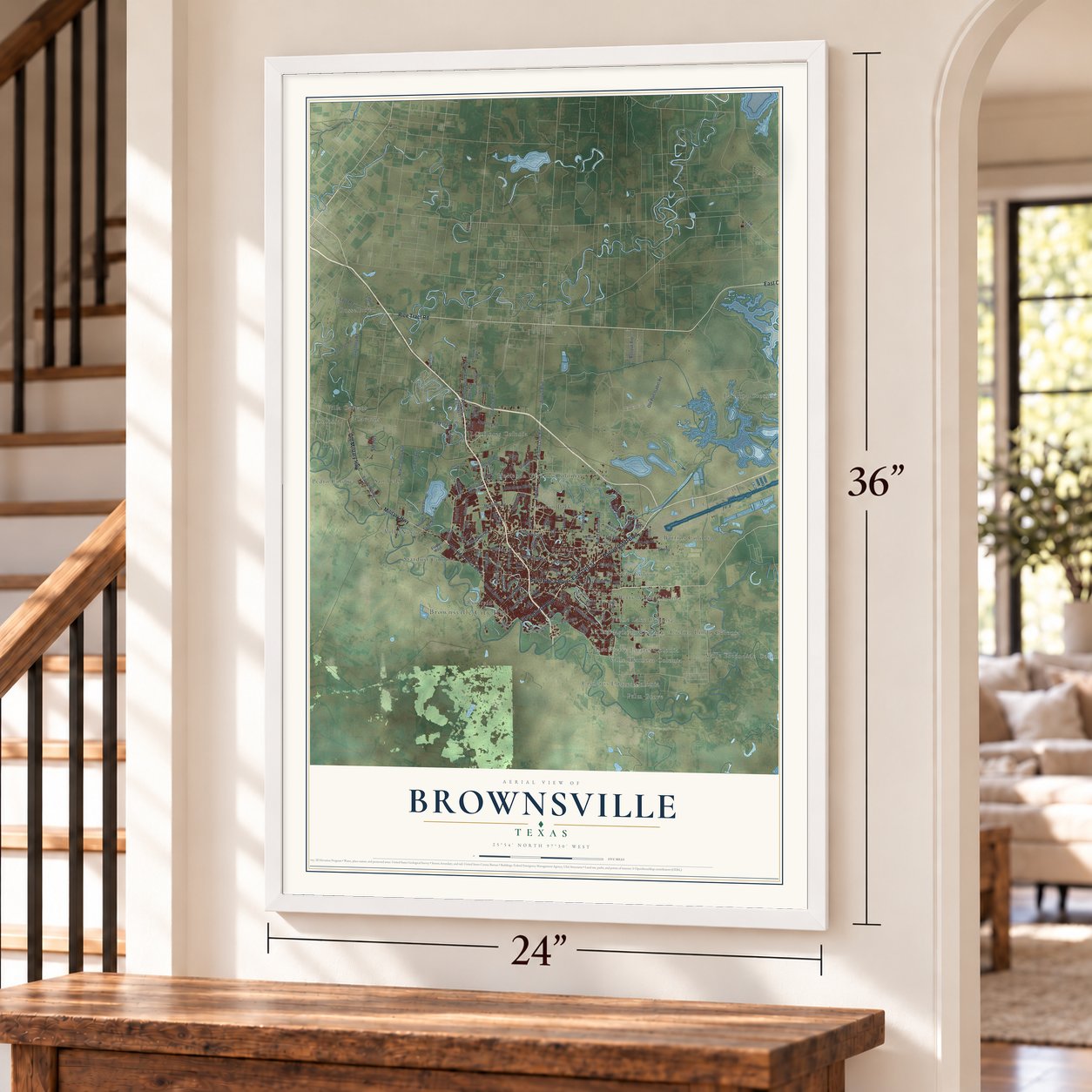 Brownsville, Texas map, 24 x 36 inch print in a white frame by a staircase