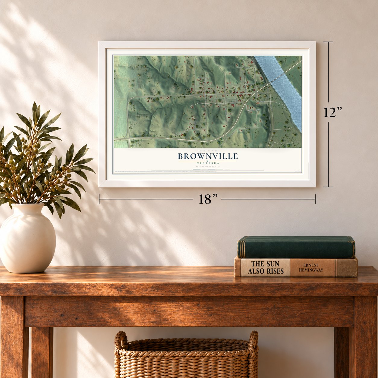 Brownville, Nebraska map, 12 x 18 inch print in a white frame in an entryway