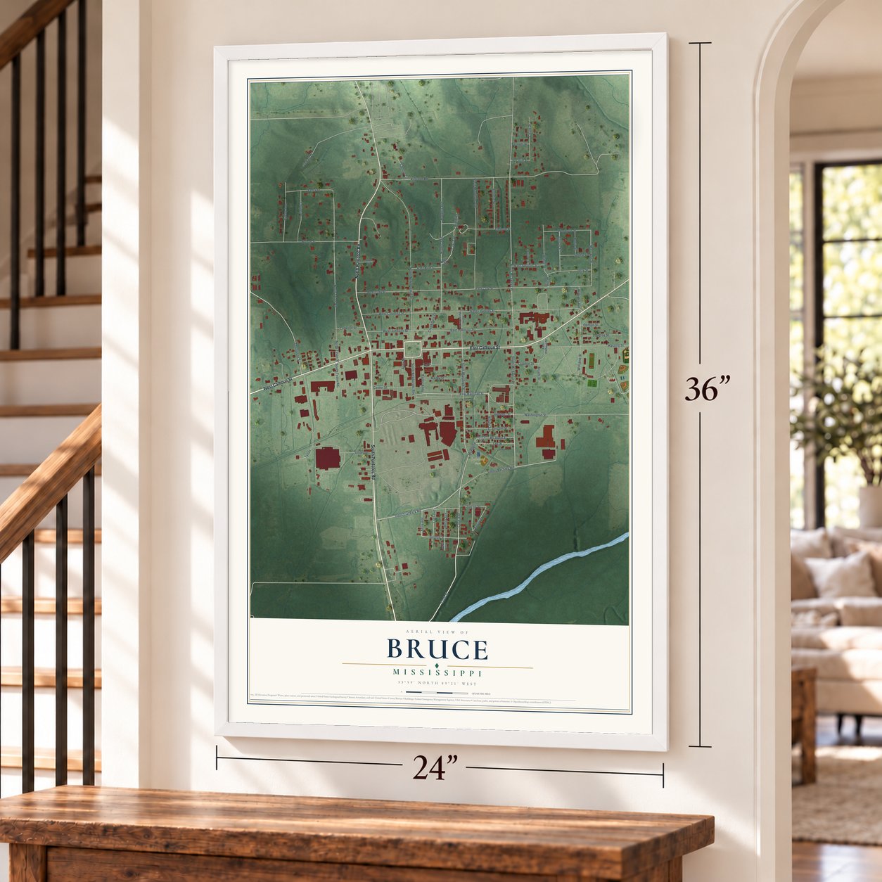 Bruce, Mississippi map, 24 x 36 inch print in a white frame by a staircase