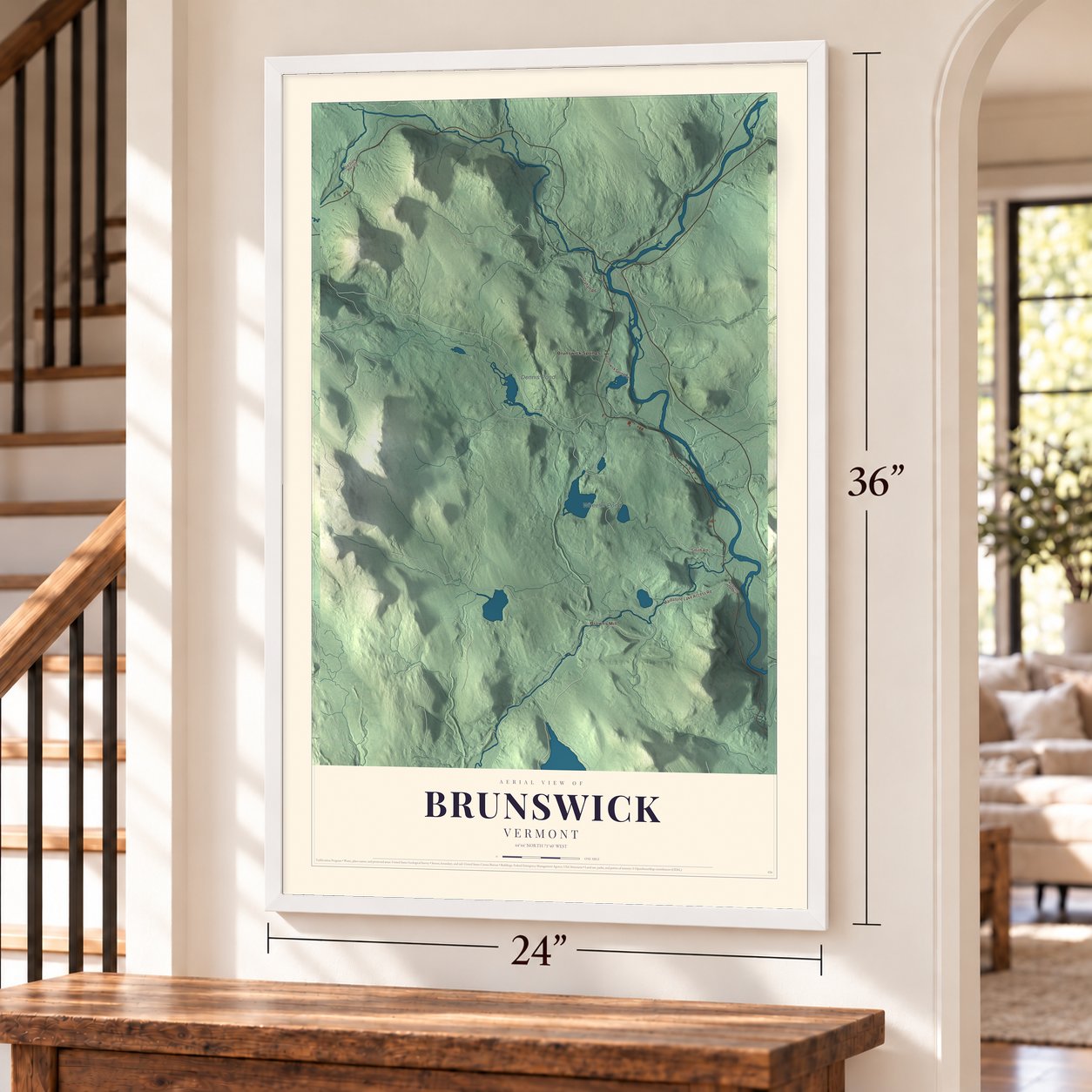 Brunswick, Vermont map, 24 x 36 inch print in a white frame by a staircase