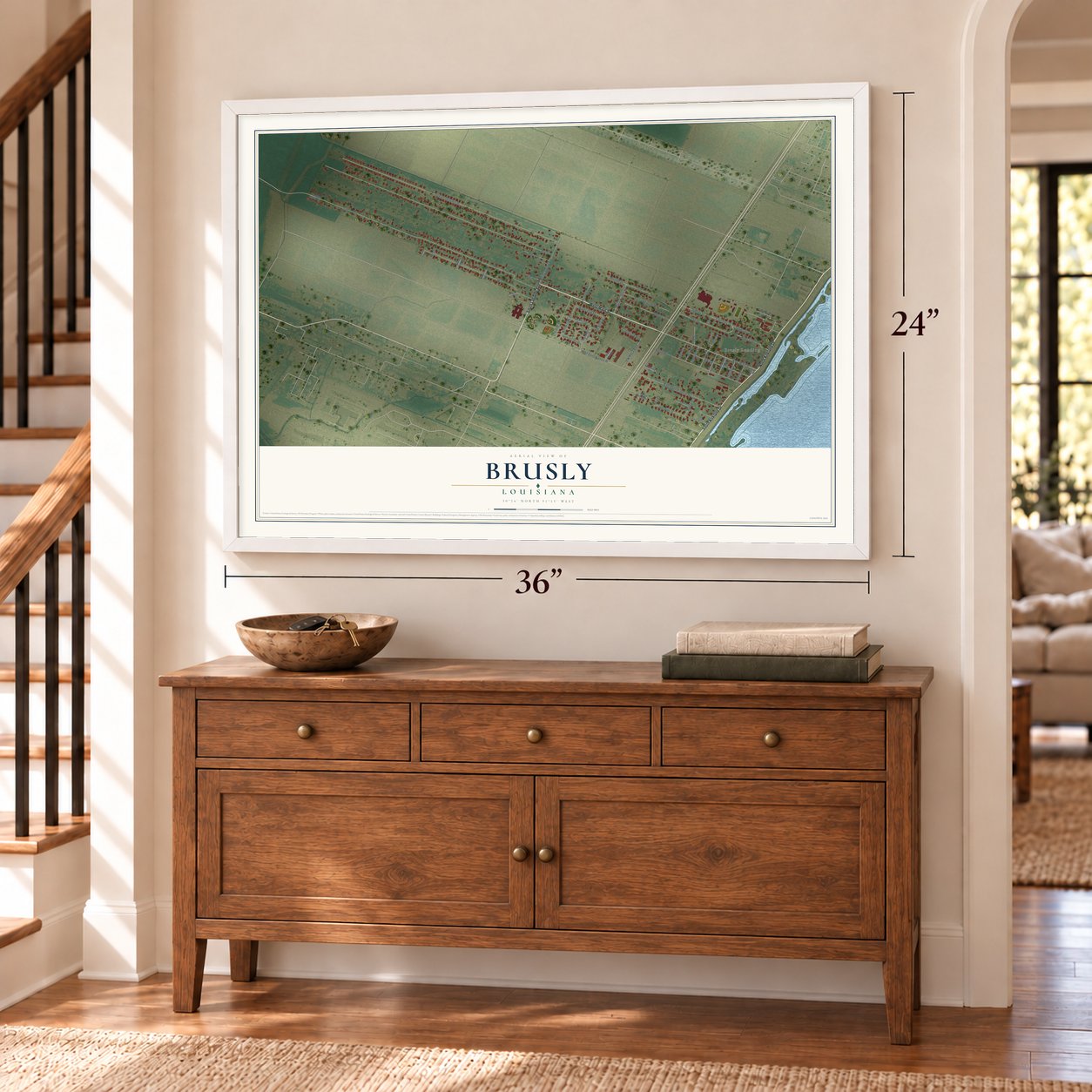 Brusly, Louisiana map, 24 x 36 inch print in a white frame above a dresser by a staircase