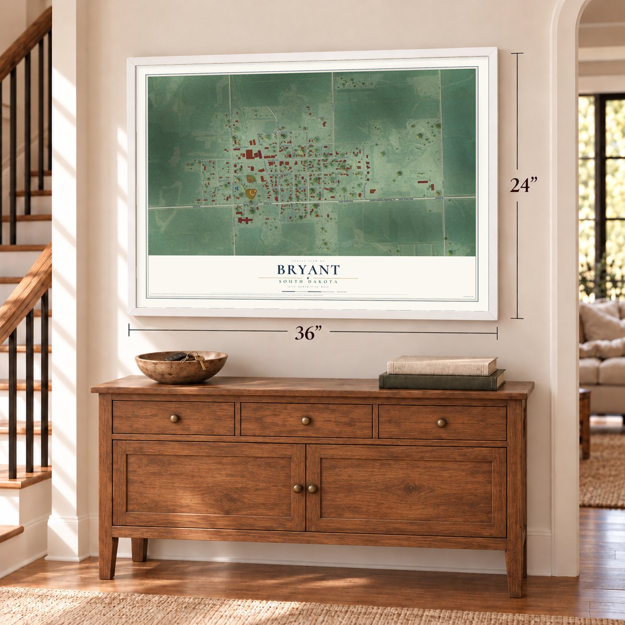 Bryant, South Dakota map, 24 x 36 inch print in a white frame above a dresser by a staircase