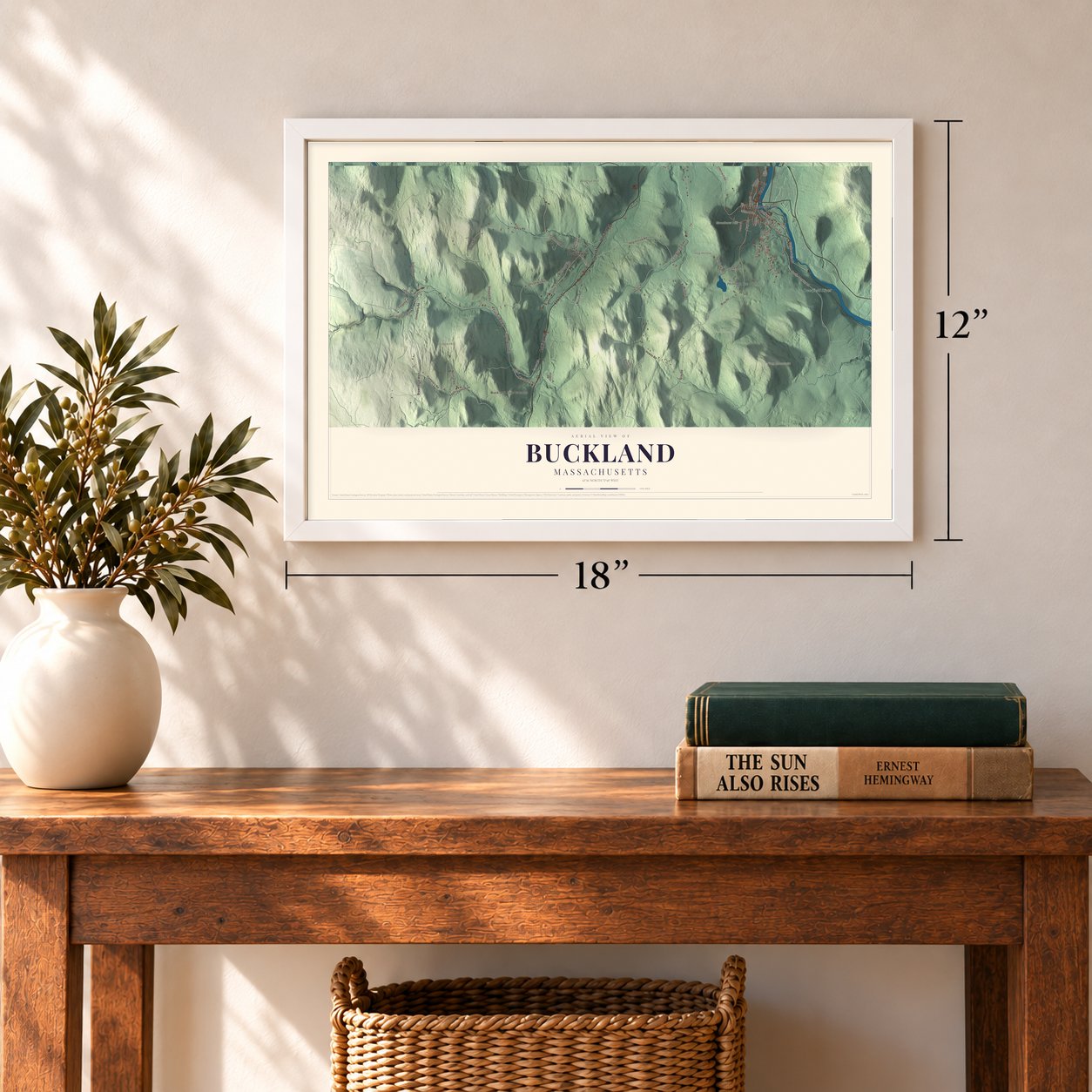 Buckland, Massachusetts map, 12 x 18 inch print in a white frame in an entryway