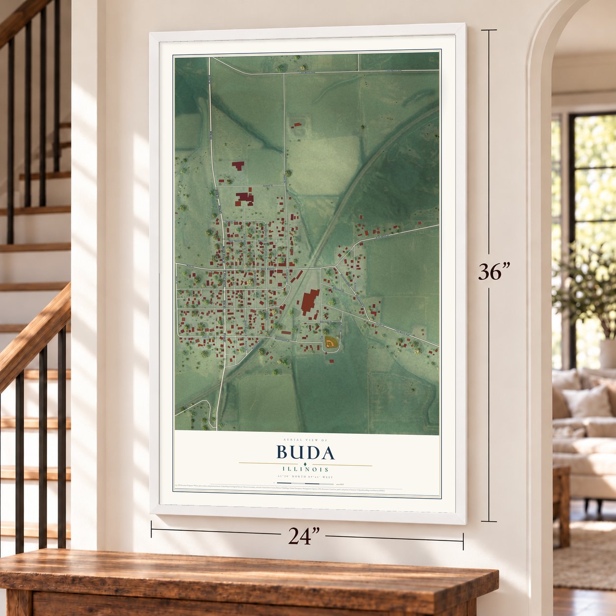 Buda, Illinois map, 24 x 36 inch print in a white frame by a staircase