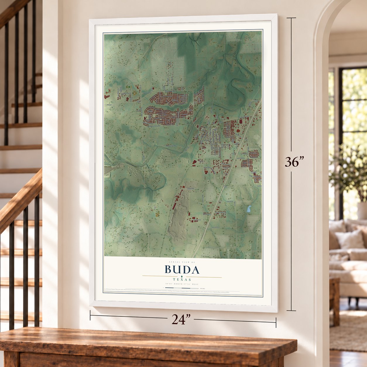 Buda, Texas map, 24 x 36 inch print in a white frame by a staircase