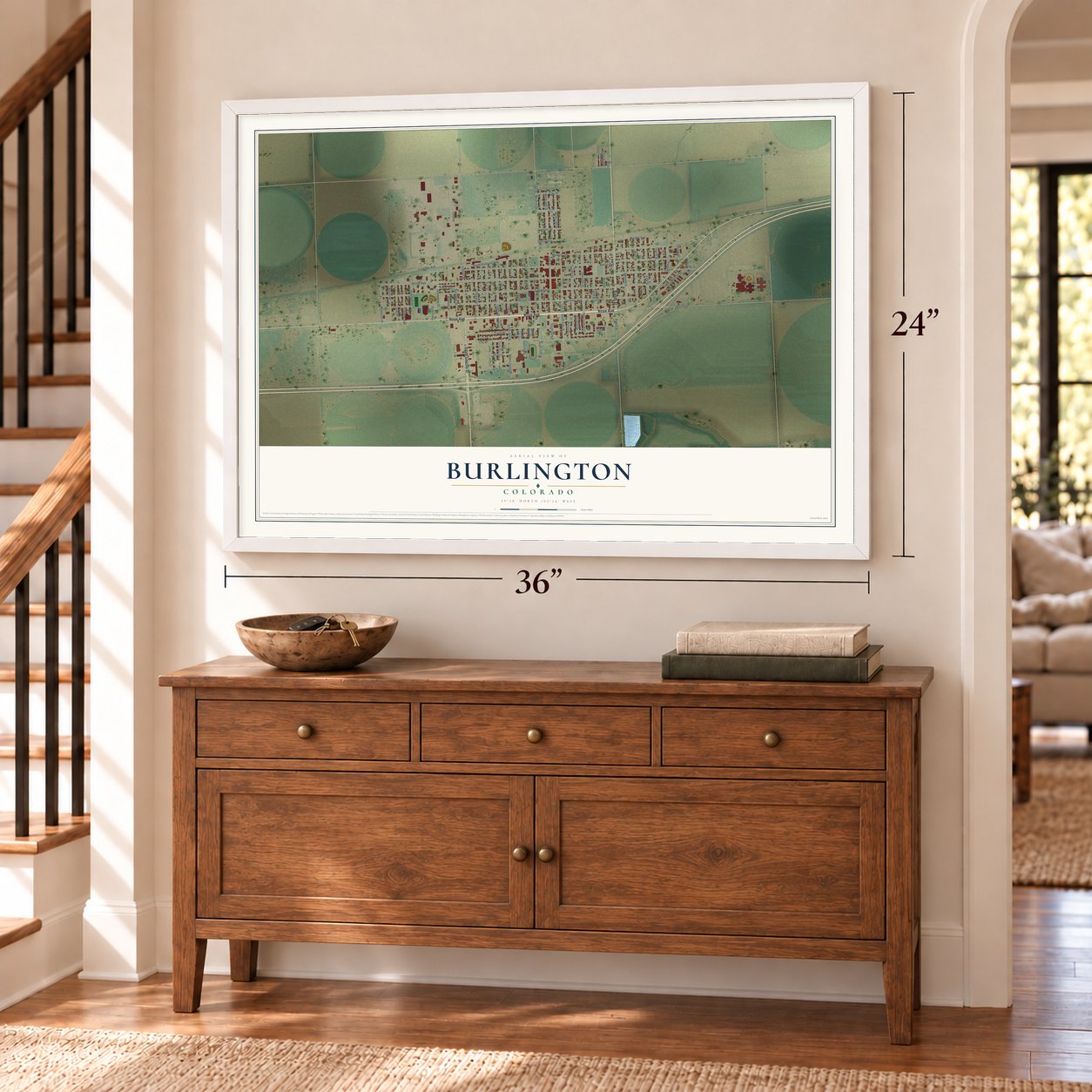 Burlington, Colorado map, 24 x 36 inch print in a white frame above a dresser by a staircase