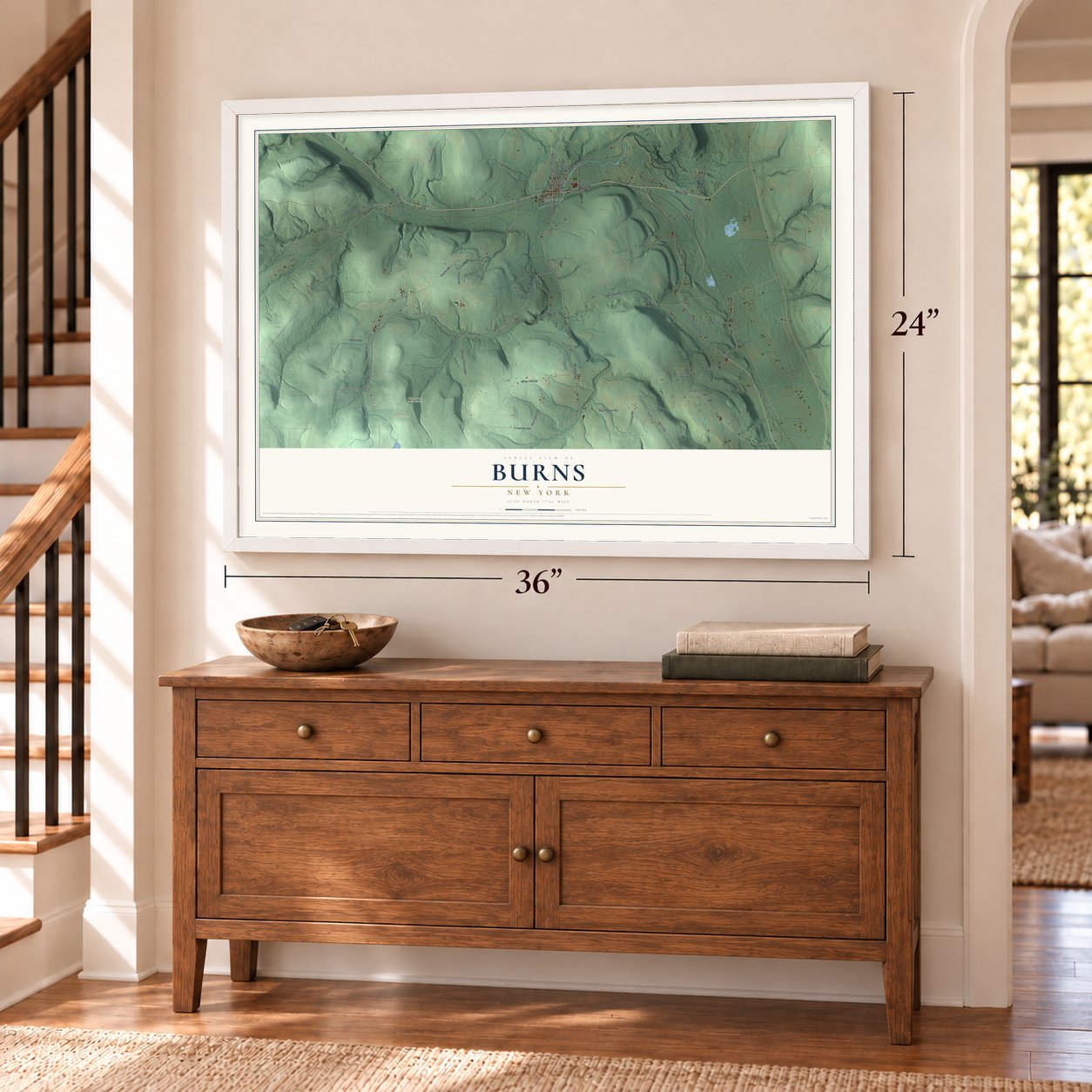 Burns, New York map, 24 x 36 inch print in a white frame above a dresser by a staircase