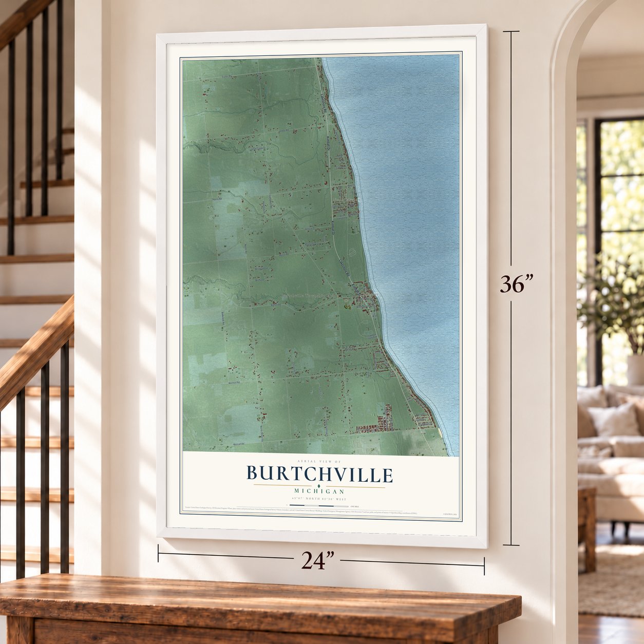 Burtchville, Michigan map, 24 x 36 inch print in a white frame by a staircase