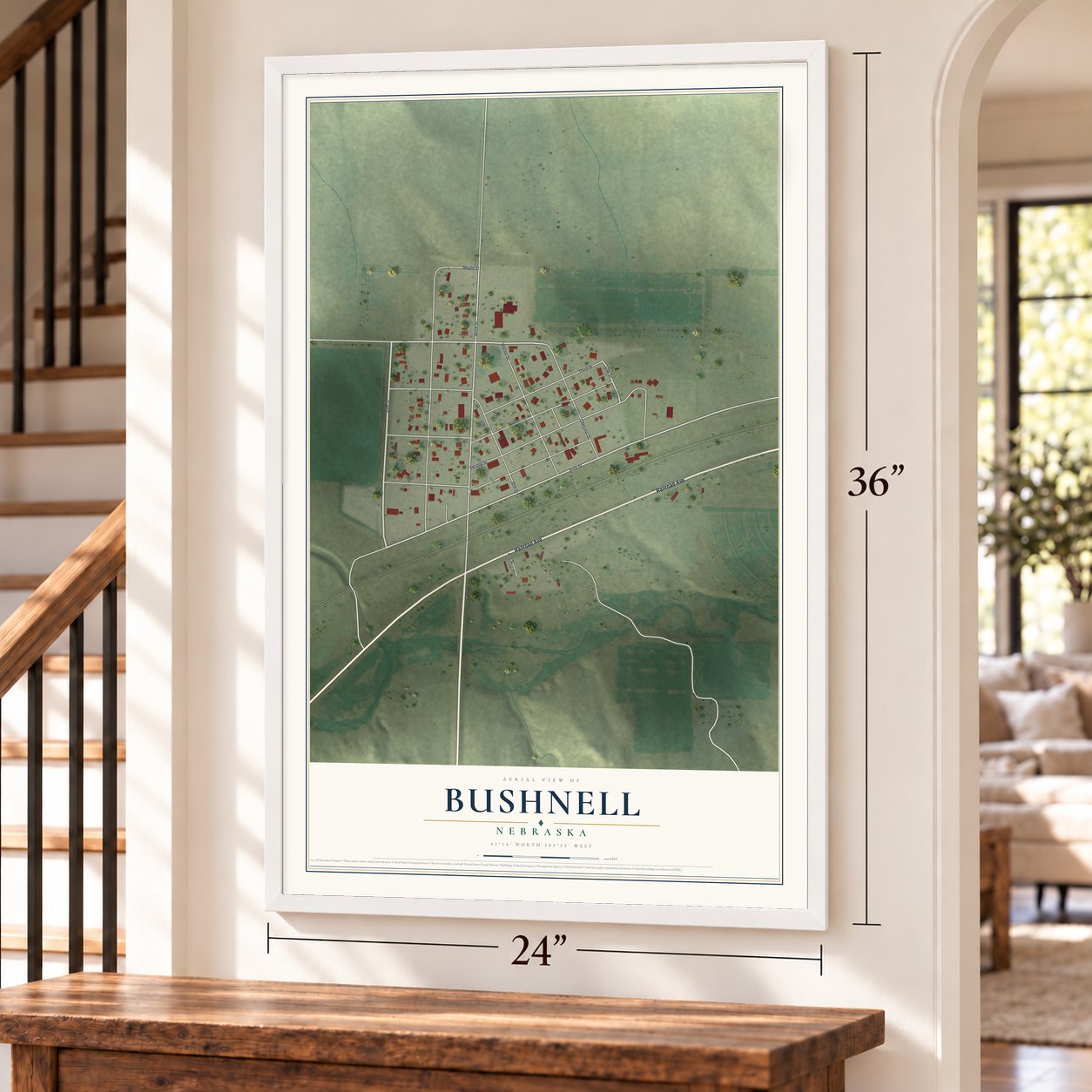 Bushnell, Nebraska map, 24 x 36 inch print in a white frame by a staircase