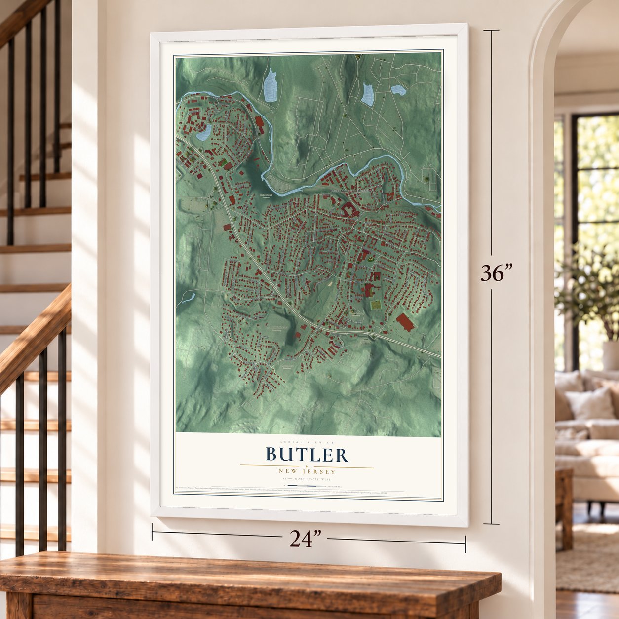 Butler, New Jersey map, 24 x 36 inch print in a white frame by a staircase