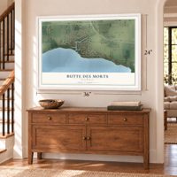 Butte des Morts, Wisconsin map, 24 x 36 inch print in a white frame above a dresser by a staircase