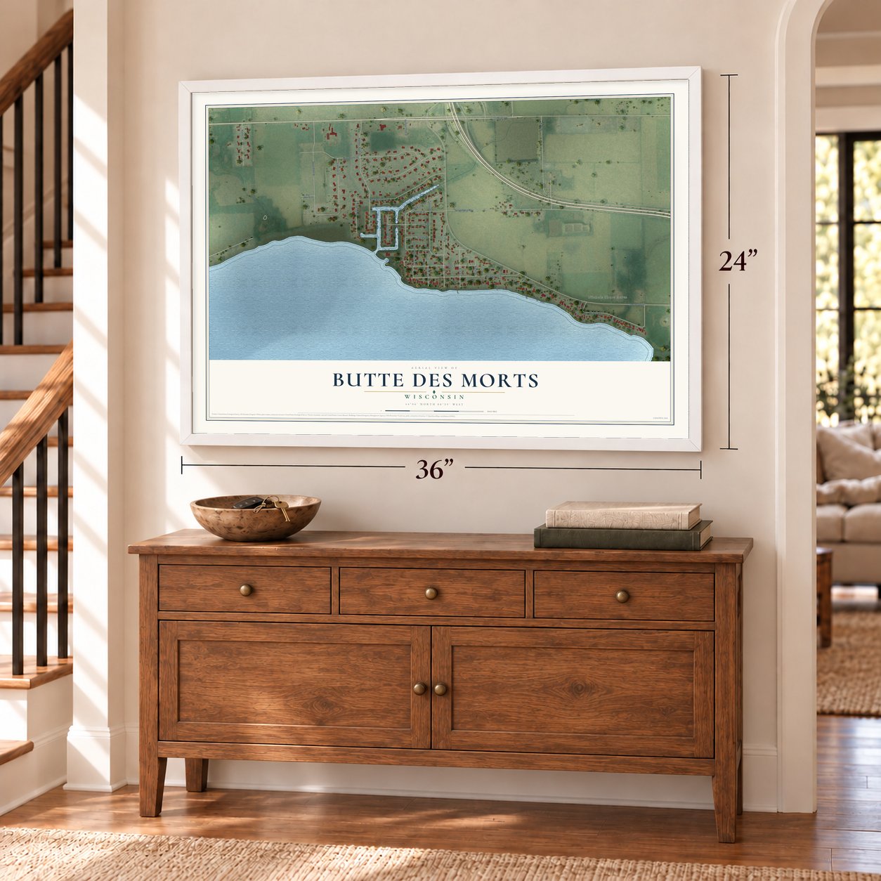 Butte des Morts, Wisconsin map, 24 x 36 inch print in a white frame above a dresser by a staircase
