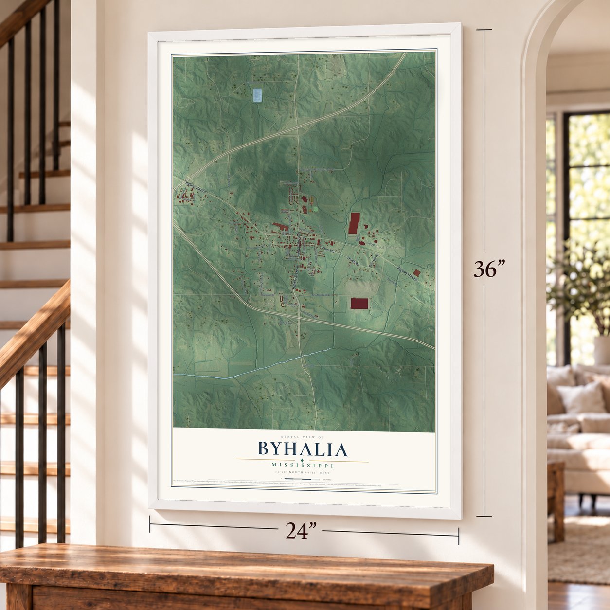 Byhalia, Mississippi map, 24 x 36 inch print in a white frame by a staircase