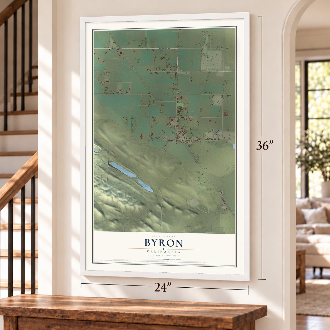 Byron, California map, 24 x 36 inch print in a white frame by a staircase