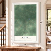 Byron, New York map, 24 x 36 inch print in a white frame by a staircase