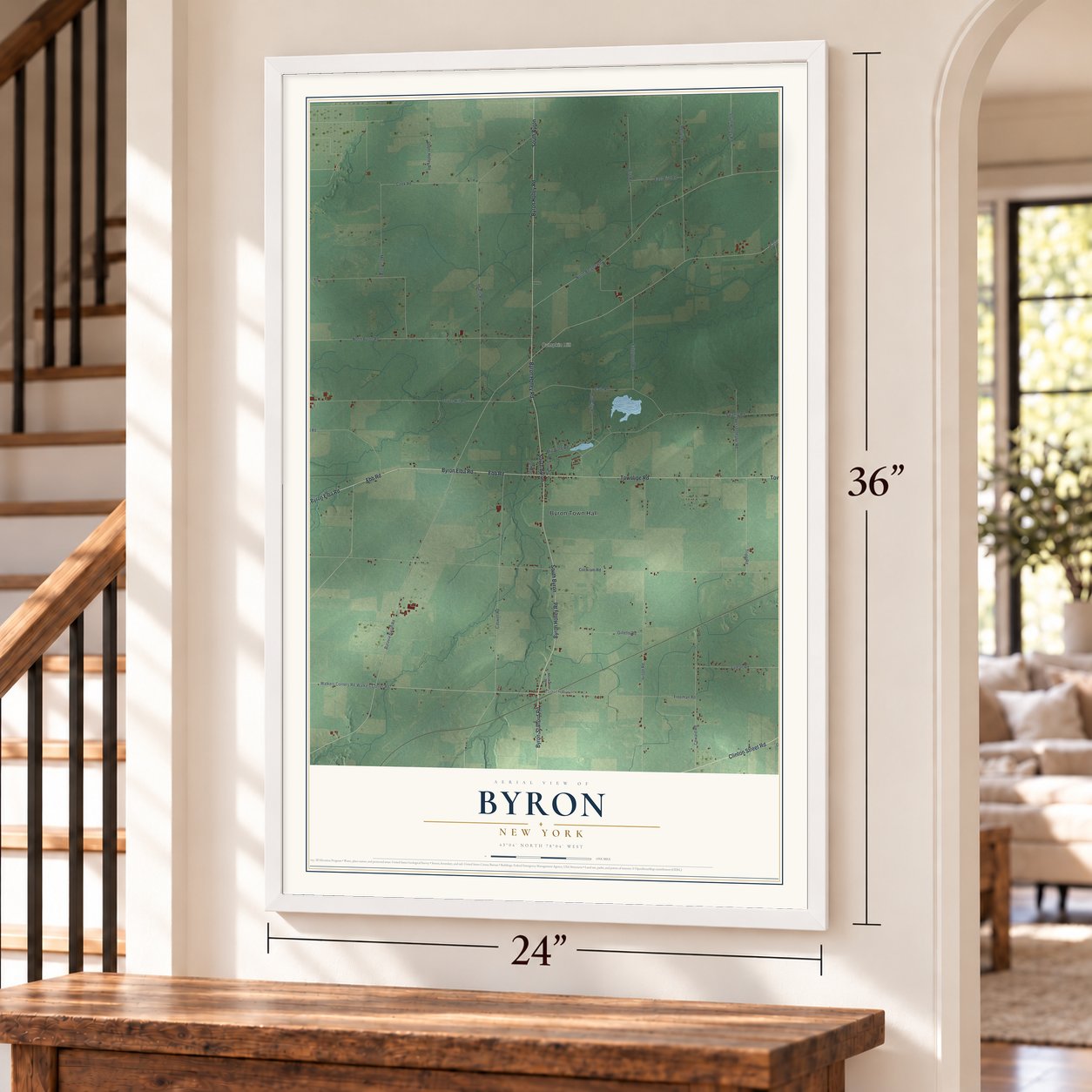 Byron, New York map, 24 x 36 inch print in a white frame by a staircase