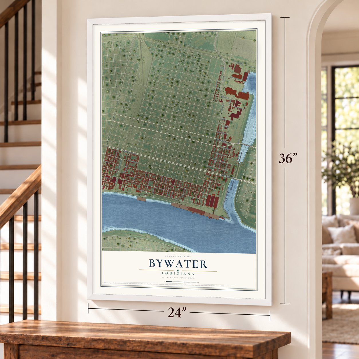 Bywater, Louisiana map, 24 x 36 inch print in a white frame by a staircase