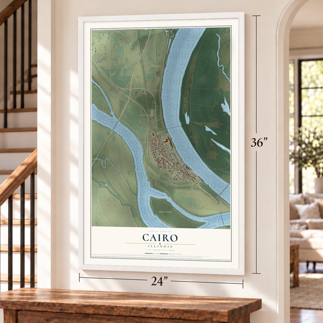 Cairo, Illinois map, 24 x 36 inch print in a white frame by a staircase