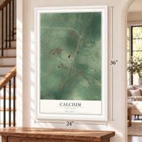 Calcium, New York map, 24 x 36 inch print in a white frame by a staircase
