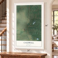 Caldwell, Arkansas map, 24 x 36 inch print in a white frame by a staircase