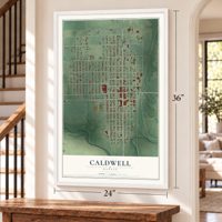 Caldwell, Kansas map, 24 x 36 inch print in a white frame by a staircase