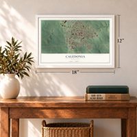 Caledonia, Minnesota map, 12 x 18 inch print in a white frame in an entryway