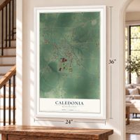 Caledonia, Mississippi map, 24 x 36 inch print in a white frame by a staircase