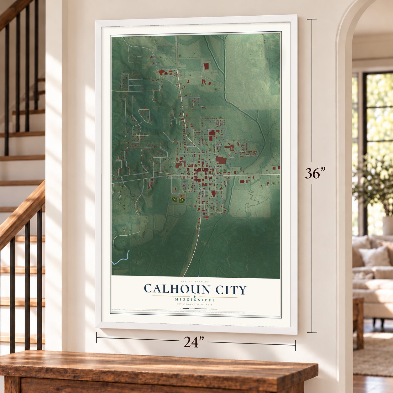 Calhoun City, Mississippi map, 24 x 36 inch print in a white frame by a staircase