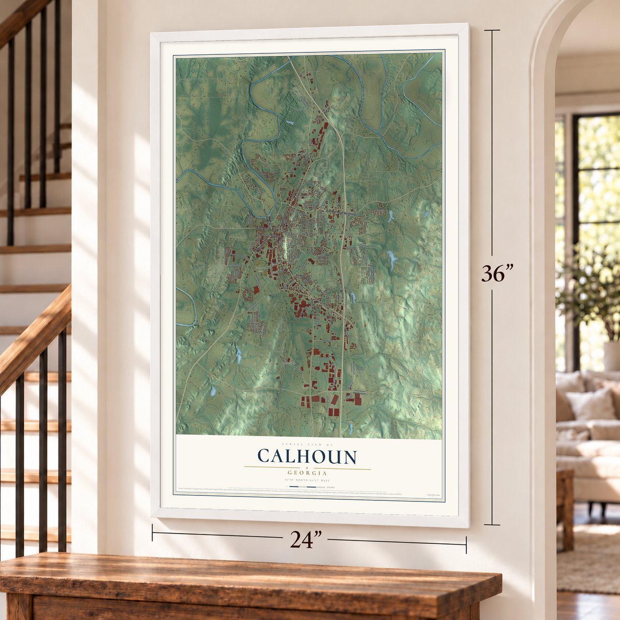 Calhoun, Georgia map, 24 x 36 inch print in a white frame by a staircase
